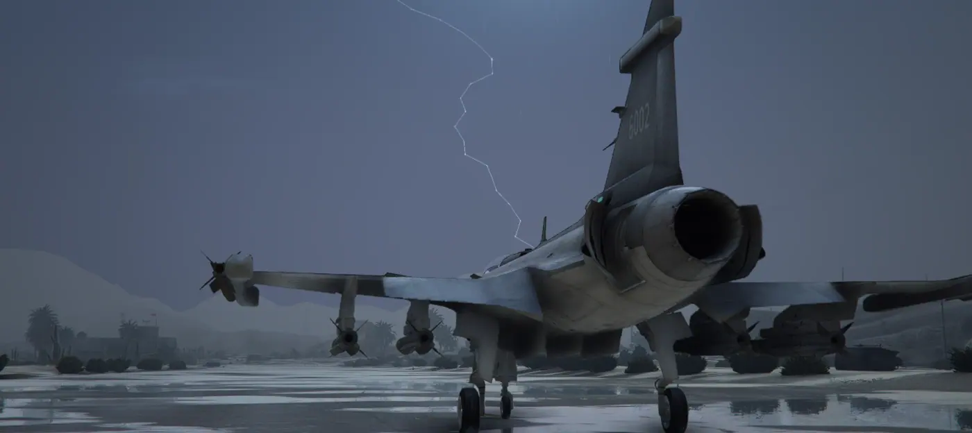 Saab JAS 39 Gripen seen from behind on a flooded apron with lightning breaking over the ridge on the MCS FiveM server
